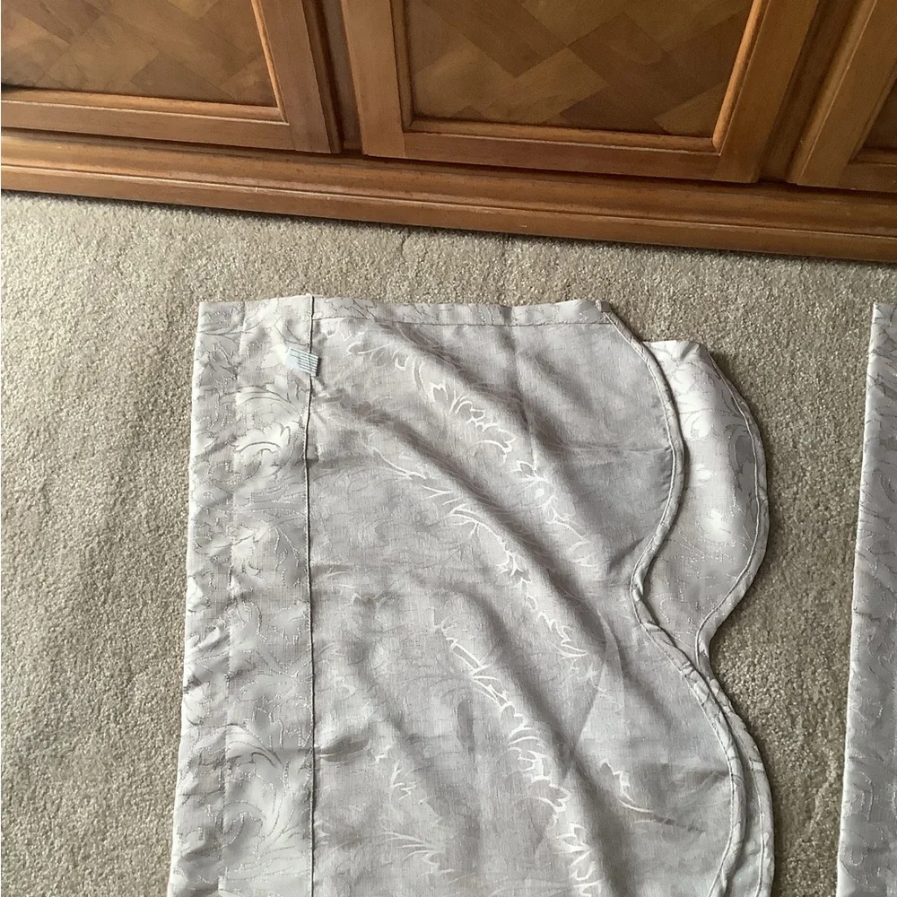 Valance set of (2) beige with pretty designs only used 6 months like new…
